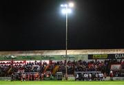 6 October 2023; Players take a break as the game is paused due to a medical situation in the crowd during the SSE Airtricity Men's Premier Division match between Shelbourne and Dundalk at Tolka Park in Dublin. Photo by Stephen McCarthy/Sportsfile