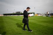 7 October 2023; RTÉ's Stuart Byrne reads his notes before the Sports Direct Men’s FAI Cup semi-final match between Galway United and Bohemians at Eamonn Deacy Park in Galway. Photo by Stephen McCarthy/Sportsfile
