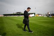 7 October 2023; RTÉ's Stuart Byrne reads his notes before the Sports Direct Men’s FAI Cup semi-final match between Galway United and Bohemians at Eamonn Deacy Park in Galway. Photo by Stephen McCarthy/Sportsfile