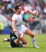 7 October 2023; Billy Burns of Ulster is tackled by Duncan Munn of Glasgow Warriors during the pre-season friendly match between Ulster and Glasgow Warriors at Kingspan Breffni in Cavan. Photo by Ben McShane/Sportsfile