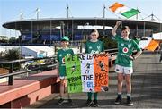 7 October 2023; Ireland supporters, from left, Senan, age 10, Doireann, age 12, and Donagh O'Brien, age 13, from Blessington, Wicklow, before the 2023 Rugby World Cup Pool B match between Ireland and Scotland at the Stade de France in Paris, France. Photo by Harry Murphy/Sportsfile