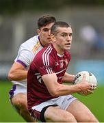 7 October 2023; James O'Kane of Raheny in action against Theo Clancy of Kilmacud Crokes during the Dublin County Senior Club Championship Football Semi-Final match between Kilmacud Crokes and Raheny at Parnell Park in Dublin. Photo by Stephen Marken/Sportsfile