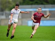 7 October 2023; Theo Clancy of Kilmacud Crokes in action against James O'Kane of Raheny during the Dublin County Senior Club Championship Football Semi-Final match between Kilmacud Crokes and Raheny at Parnell Park in Dublin. Photo by Stephen Marken/Sportsfile