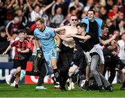 7 October 2023; Bohemians supporters celebrate with goalkeeper James Talbot after the Sports Direct Men’s FAI Cup semi-final match between Galway United and Bohemians at Eamonn Deacy Park in Galway. Photo by Stephen McCarthy/Sportsfile