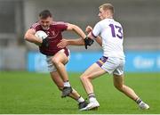 7 October 2023; Ben McHugh of Raheny in action against Paul Mannion of Kilmacud Crokes during the Dublin County Senior Club Championship Football Semi-Final match between Kilmacud Crokes and Raheny at Parnell Park in Dublin. Photo by Stephen Marken/Sportsfile