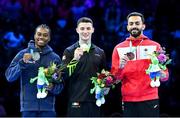 7 October 2023; Rhys McClenaghan of Ireland, centre, who won gold, with Khoi Youbf of America, left, who won silver, and Ahmad Abu Al-Soud of Jordan, who won bronze, after the Men's Pommel Horse Final at the 2023 World Artistic Gymnastics Championships at the Antwerps Sportpaleis in Antwerp, Belgium. Photo by Filippo Tomasi/Sportsfile