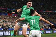 7 October 2023; James Lowe of Ireland, 11, celebrates with teammate Dan Sheehan after scoring their side's first try during the 2023 Rugby World Cup Pool B match between Ireland and Scotland at the Stade de France in Paris, France. Photo by Harry Murphy/Sportsfile