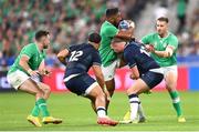 7 October 2023; Bundee Aki of Ireland is tackled by Finn Russell of Scotland during the 2023 Rugby World Cup Pool B match between Ireland and Scotland at the Stade de France in Paris, France. Photo by Ramsey Cardy/Sportsfile