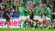 7 October 2023; Iain Henderson of Ireland, second from left, is congratulated by teammate Jonathan Sexton, 10, after scoring their side's third try during the 2023 Rugby World Cup Pool B match between Ireland and Scotland at the Stade de France in Paris, France. Photo by Brendan Moran/Sportsfile