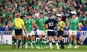 7 October 2023; Referee Nic Berry speak with Finn Russell of Scotland, 10, and Jonathan Sexton of Ireland, left, during the 2023 Rugby World Cup Pool B match between Ireland and Scotland at the Stade de France in Paris, France. Photo by Harry Murphy/Sportsfile