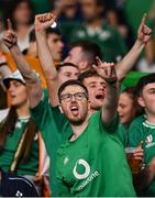 7 October 2023; An Ireland supporter celebrates after his side's victory in the 2023 Rugby World Cup Pool B match between Ireland and Scotland at the Stade de France in Paris, France. Photo by Ramsey Cardy/Sportsfile