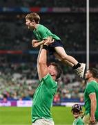 7 October 2023; Peter O’Mahony of Ireland celebrates with his son Theo after their side's victory in the 2023 Rugby World Cup Pool B match between Ireland and Scotland at the Stade de France in Paris, France. Photo by Harry Murphy/Sportsfile