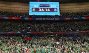 7 October 2023; The final score is seen on the scoreboard as Ireland supporters celebrate after the 2023 Rugby World Cup Pool B match between Ireland and Scotland at the Stade de France in Paris, France. Photo by Harry Murphy/Sportsfile