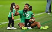 7 October 2023; Bundee Aki of Ireland celebrates with his children Ailbhe Ali'itasi Aki and Andronikas after the 2023 Rugby World Cup Pool B match between Ireland and Scotland at the Stade de France in Paris, France. Photo by Brendan Moran/Sportsfile