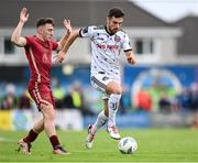 7 October 2023; Jordan Flores of Bohemians in action against Ed McCarthy of Galway United during the Sports Direct Men’s FAI Cup semi-final match between Galway United and Bohemians at Eamonn Deacy Park in Galway. Photo by Stephen McCarthy/Sportsfile
