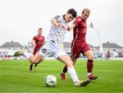 7 October 2023; James Clarke of Bohemians in action against David Hurley of Galway United during the Sports Direct Men’s FAI Cup semi-final match between Galway United and Bohemians at Eamonn Deacy Park in Galway. Photo by Stephen McCarthy/Sportsfile