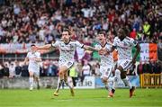 7 October 2023; Dylan Connolly of Bohemians celebrates after scoring his side's first goal with team-mates Jonathan Afolabi, right, and Ali Coote during the Sports Direct Men’s FAI Cup semi-final match between Galway United and Bohemians at Eamonn Deacy Park in Galway. Photo by Stephen McCarthy/Sportsfile