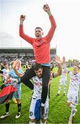 7 October 2023; Luke Dennison is lifted by his Bohemians team-mate Jordan Flores in celebration after the Sports Direct Men’s FAI Cup semi-final match between Galway United and Bohemians at Eamonn Deacy Park in Galway. Photo by Stephen McCarthy/Sportsfile