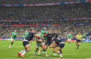 7 October 2023; Jamison Gibson-Park of Ireland in action against Duhan van der Merwe and Richie Gray of Scotland during the 2023 Rugby World Cup Pool B match between Ireland and Scotland at the Stade de France in Paris, France. Photo by Harry Murphy/Sportsfile