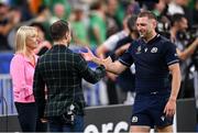 7 October 2023; Finn Russell of Scotland and former Scotland player Greig Laidlaw after the 2023 Rugby World Cup Pool B match between Ireland and Scotland at the Stade de France in Paris, France. Photo by Ramsey Cardy/Sportsfile