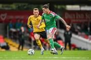 8 October 2023; Ruairi Keating of Cork City in action against Jamie Lennon of St Patrick's Athletic during the Sports Direct Men’s FAI Cup semi-final match between Cork City and St Patrick's Athletic at Turner’s Cross in Cork. Photo by Stephen McCarthy/Sportsfile