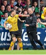 8 October 2023; Anto Breslin of St Patrick's Athletic and Cork City manager Richie Holland tussle over possession of the ball during the Sports Direct Men’s FAI Cup semi-final match between Cork City and St Patrick's Athletic at Turner’s Cross in Cork. Photo by Stephen McCarthy/Sportsfile