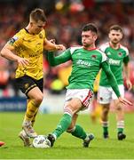 8 October 2023; Tommy Lonergan of St Patrick's Athletic in action against Joshua Honohan of Cork City during the Sports Direct Men’s FAI Cup semi-final match between Cork City and St Patrick's Athletic at Turner’s Cross in Cork. Photo by Eóin Noonan/Sportsfile