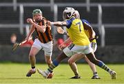 8 October 2023; Zane Keenan of Camross in action against Lawson Obular of Abbeyleix St Lazarian's during the Laois County Senior Hurling Championship Final match between Abbeyleix St Lazarians and Camross at Laois Hire O'Moore Park in Portlaoise, Laois. Photo by Ben McShane/Sportsfile