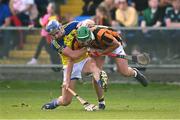 8 October 2023; Mark Dowling of Camross is tackled by Oisin Carroll of Abbeyleix St Lazarian's during the Laois County Senior Hurling Championship Final match between Abbeyleix St Lazarians and Camross at Laois Hire O'Moore Park in Portlaoise, Laois. Photo by Ben McShane/Sportsfile