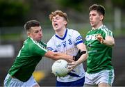 8 October 2023; Ben Guckian of St Mary's Kiltoghert in action against Alan Tuthill, left, and Liam Rowley of Mohill during the Leitrim County Senior Club Football Championship final match between Mohill and St Mary's Kiltoghert at Avant Money Páirc Seán Mac Diarmada in Carrick-on-Shannon, Leitrim. Photo by Piaras Ó Mídheach/Sportsfile