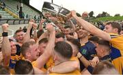8 October 2023; Summerhill players celebrate with the Keegan Cup after their side's victory in the Meath County Senior Club Football Championship final match between Summerhill and Ratoath at Páirc Tailteann in Navan, Meath. Photo by Seb Daly/Sportsfile