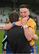 8 October 2023; Jamie O’Shea of Summerhill celebrates with a supporter after their side's victory in the Meath County Senior Club Football Championship final match between Summerhill and Ratoath at Páirc Tailteann in Navan, Meath. Photo by Seb Daly/Sportsfile