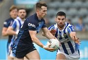 8 October 2023; Liam Connerton of St Judes in action against Shane Clayton of Ballyboden St Endas during the Dublin County Senior Club Football Championship semi-final match between St Judes and Ballyboden St Endas at Parnell Park in Dublin. Photo by Sam Barnes/Sportsfile
