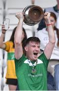 8 October 2023; Mohill captain Shane Quinn lifts the Fenagh Cup after his side's victory in the Leitrim County Senior Club Football Championship final match between Mohill and St Mary's Kiltoghert at Avant Money Páirc Seán Mac Diarmada in Carrick-on-Shannon, Leitrim. Photo by Piaras Ó Mídheach/Sportsfile