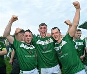 8 October 2023; Mohill players, from left, Ryan Bohan, Keith Keegan and James Mitchell celebrate after their side's victory in the Leitrim County Senior Club Football Championship final match between Mohill and St Mary's Kiltoghert at Avant Money Páirc Seán Mac Diarmada in Carrick-on-Shannon, Leitrim. Photo by Piaras Ó Mídheach/Sportsfile