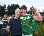 8 October 2023; Jordan Reynolds celebrates with his father Colm after victory in the Leitrim County Senior Club Football Championship final match between Mohill and St Mary's Kiltoghert at Avant Money Páirc Seán Mac Diarmada in Carrick-on-Shannon, Leitrim. Photo by Piaras Ó Mídheach/Sportsfile