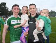 8 October 2023; Man of the Match Ronan Kennedy of Mohill celebrates with his niece Cáit, his brother Ciarán and his niece Siún, right, after victory in the Leitrim County Senior Club Football Championship final match between Mohill and St Mary's Kiltoghert at Avant Money Páirc Seán Mac Diarmada in Carrick-on-Shannon, Leitrim. Photo by Piaras Ó Mídheach/Sportsfile