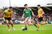 8 October 2023; Aaron Bolger of Cork City in action against Joe Redmond, left, and Kian Leavy of St Patrick's Athletic during the Sports Direct Men’s FAI Cup semi-final match between Cork City and St Patrick's Athletic at Turner’s Cross in Cork. Photo by Stephen McCarthy/Sportsfile