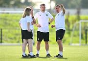 9 October 2023; Head coach James Scott, right, with, from left, assistant coach Orla Haran, opposition analyst Tommy Carberry and assistant coach Rob Sweeney during a Republic of Ireland women's U17 training session at the FAI National Training Centre in Abbotstown, Dublin. Photo by Ben McShane/Sportsfile