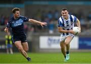 8 October 2023; Colm Basquel of Ballyboden St Endas in action against David Sheehy of St Judes  during the Dublin County Senior Club Football Championship semi-final match between St Judes and Ballyboden St Endas at Parnell Park in Dublin. Photo by Sam Barnes/Sportsfile