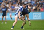 8 October 2023; Oisin Manning of St Judes is tackled by Ryan Basquel of Ballyboden St Endas during the Dublin County Senior Club Football Championship semi-final match between St Judes and Ballyboden St Endas at Parnell Park in Dublin. Photo by Sam Barnes/Sportsfile