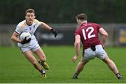 7 October 2023; Cian O'Connor of Kilmacud Crokes in action against Alan McLoughlin of Raheny during the Dublin County Senior Club Championship Football Semi-Final match between Kilmacud Crokes and Raheny at Parnell Park in Dublin. Photo by Stephen Marken/Sportsfile