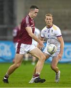 7 October 2023; Brian Fenton of Raheny in action against Paul Mannion of Kilmacud Crokes during the Dublin County Senior Club Championship Football Semi-Final match between Kilmacud Crokes and Raheny at Parnell Park in Dublin. Photo by Stephen Marken/Sportsfile