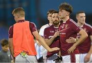 7 October 2023; Sean Grenham of Raheny is consoled by team mates after the penalty shoot-out in the Dublin County Senior Club Championship Football Semi-Final match between Kilmacud Crokes and Raheny at Parnell Park in Dublin. Photo by Stephen Marken/Sportsfile