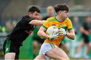 8 October 2023; Conal Cunning of Cuchullians Dunloy in action against John Carron of Erin’s Own Cargin during the Antrim County Senior Club Football Championship final match between Cuchullians Dunloy and Erin’s Own Cargin at Corrigan Park in Belfast. Photo by Ramsey Cardy/Sportsfile