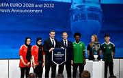 10 October 2023; The joint bid of England, Republic of Ireland, Northern Ireland, Scotland and Wales have been announced as the hosts for UEFA EURO 2028. On stage is former Wales international player Gareth Bale, third from left, and UEFA President Aleksander Ceferin, centre, with representatives from the host countries, including Shamrock Rovers player and Republic of Ireland underage international Ade Solanke, third from right, during the UEFA EURO 2028 & 2032 Host Announcement at the UEFA headquarters, in Nyon, Switzerland. Photo by Kristian Skeie/UEFA via Sportsfile