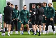 10 October 2023; Jamie McGrath and team-mates react to manager Stephen Kenny during a Republic of Ireland training session at the FAI National Training Centre in Abbotstown, Dublin. Photo by Stephen McCarthy/Sportsfile