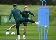 10 October 2023; Sam Szmodics and Callum Robinson, left during a Republic of Ireland training session at the FAI National Training Centre in Abbotstown, Dublin. Photo by Stephen McCarthy/Sportsfile