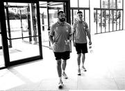 11 October 2023; (EDITORS NOTE: Image has been converted to black & white) Head coach Andy Farrell and Jonathan Sexton arrive for an Ireland Rugby media conference at Stade Omnisports des Fauvettes in Domont, France. Photo by Harry Murphy/Sportsfile