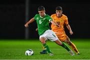 11 October 2023; Matthew Moore of Republic of Ireland in action against Davit Harutyunyan of Armenia during the UEFA European U17 Championship qualifying group 10 match between Republic of Ireland and Armenia at Carrig Park in Fermoy, Cork. Photo by Eóin Noonan/Sportsfile